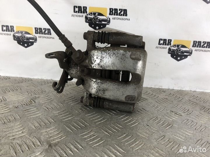 Суппорт задний левый L Opel Insignia