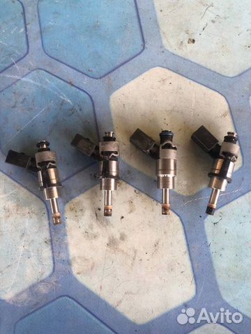 Форсунка топливная бензиновая 06F906036