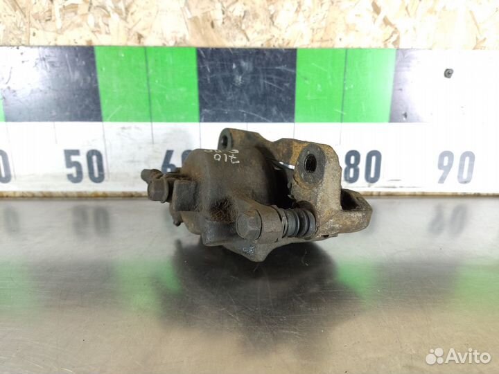 Суппорт передний правый Mazda Carol 2004-2009