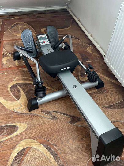 Гребной тренажер