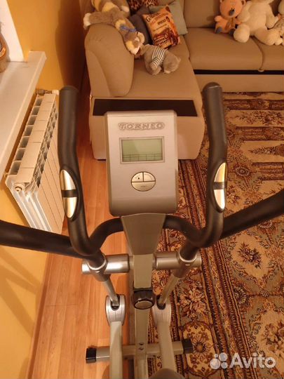 Эллиптический тренажер torneo
