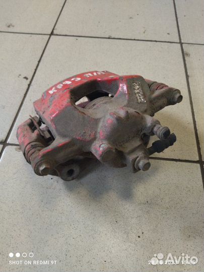 Суппорт тормозной передний правый Chevrolet Cruze