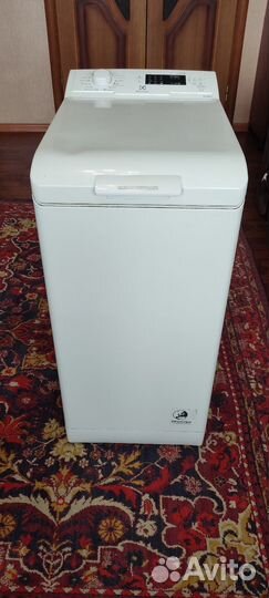 Стиральная машина с вертикальной загрузкой