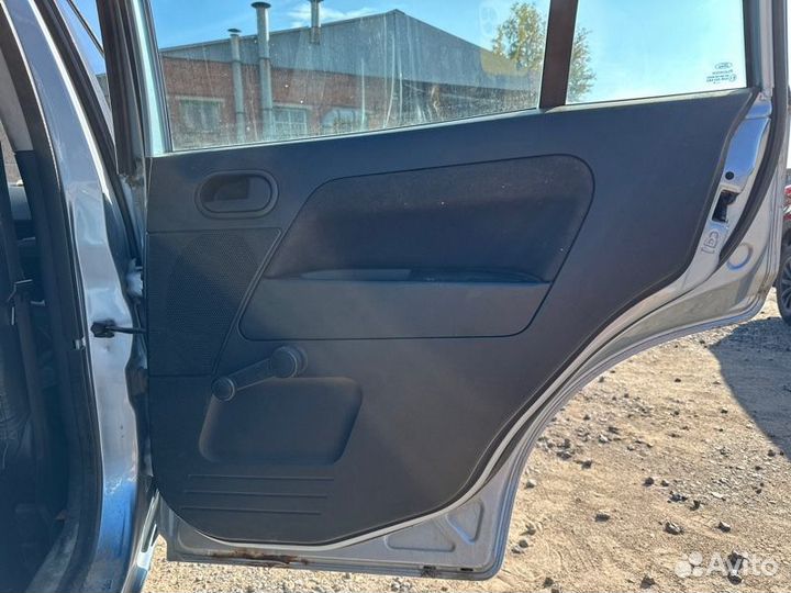 Обшивка двери Ford Fusion хетчбек 1.4 fxja 2008