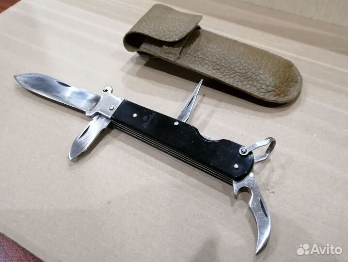 Нож охотника складной с экстракторами для гильз