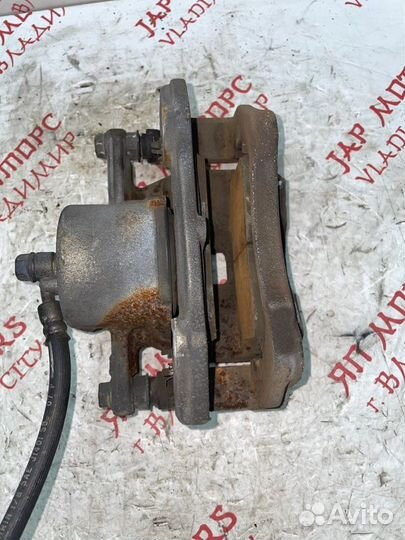 Суппорт тормозной передний правый Suzuki Grand