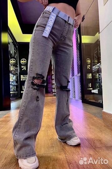 Джинсы клеш рваные