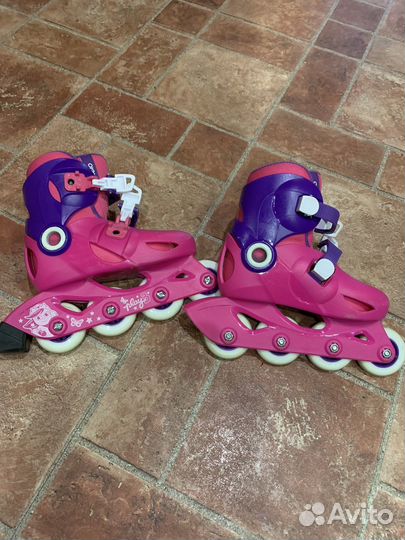 Роликовые коньки