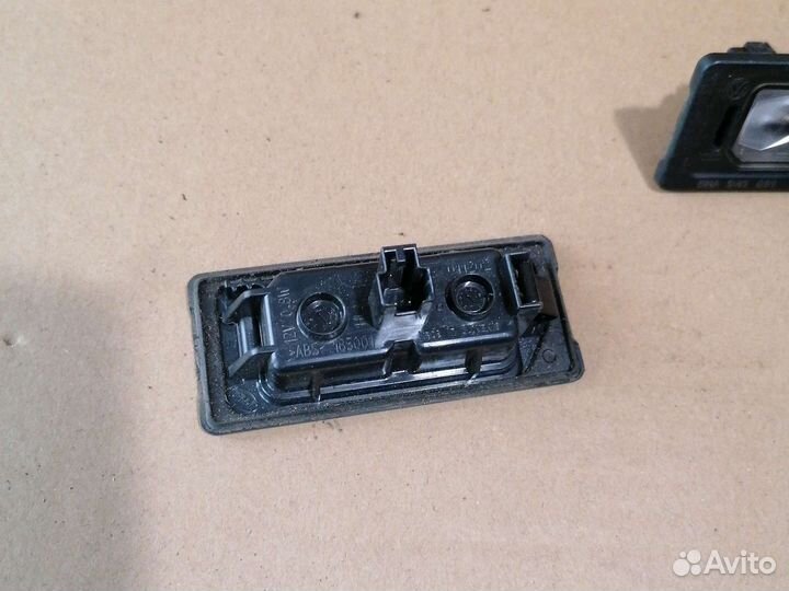 Фонарь подсветки номера фольксваген