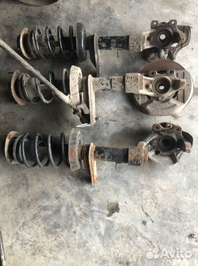 Передние стойки в сборе Део Нексия