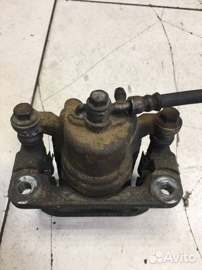 Суппорт тормозной задний левый