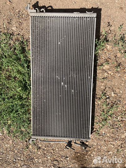 Радиатор кондиционера Lancer cedia 1.8