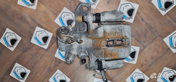 Суппорт задний левый тормозной Honda Civic 4D