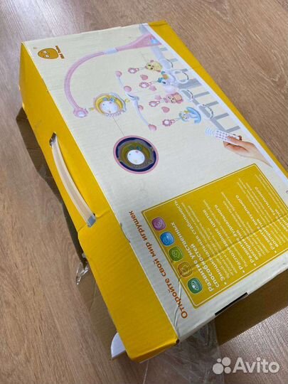 Мобиль на кроватку с проектором и мызыкой