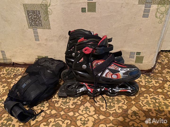 Роликовые коньки