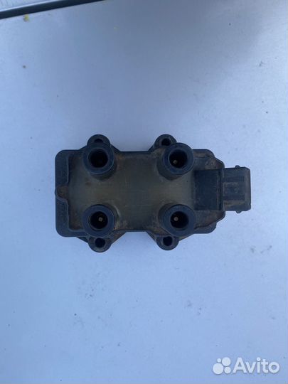 Катушка зажигания на Ford Escort 97 года