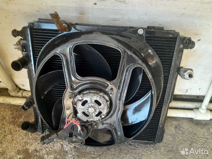 Радиаторы в зборе с винтилятором на рено 19