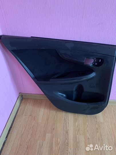 Обшивка двери toyota corolla