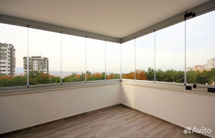 Безрамное раздвижное остекление