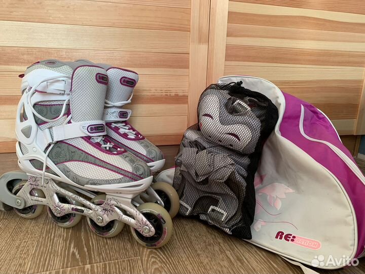 Роликовые коньки