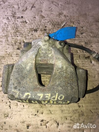 Суппорт тормозной передний левый для Opel