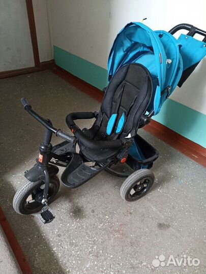 Трехколесный велосипед с поворотным сиденьем