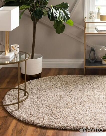 Ковер Лонж бежевый овал 1х2м