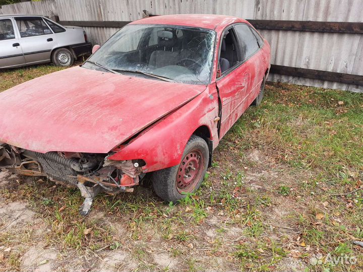 Двери мазда 626