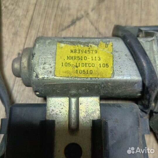 Моторчик стеклоподъемника правый Mitsubishi Canter