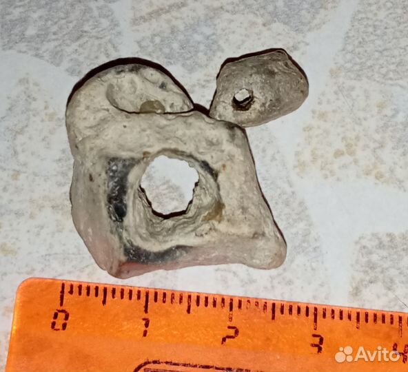 Камень с отверстиями