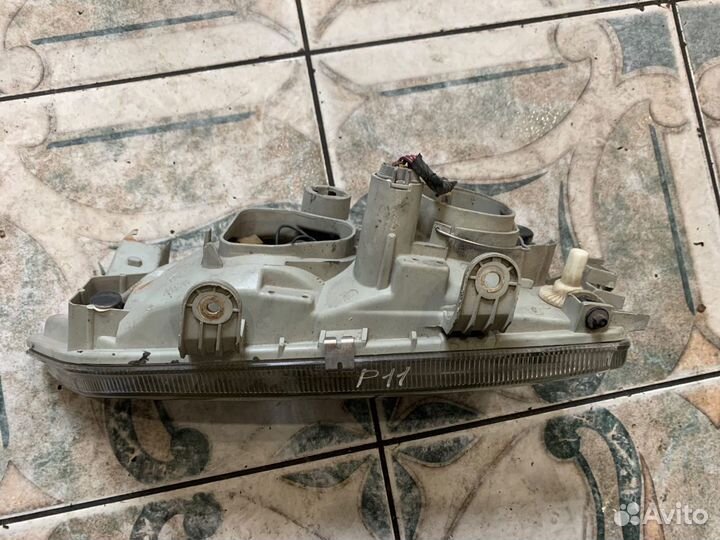 Фара Nissan Primera P11