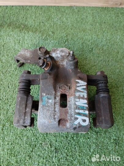 Суппорт задний левый Nissan Avenir PW11 SR20DE