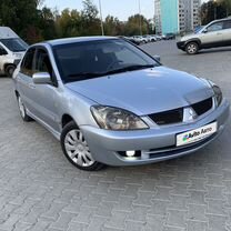 Mitsubishi Lancer 1.6 MT, 2006, 230 058 км, с пробегом, цена 397 000 руб.