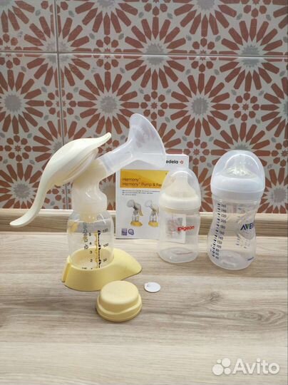 Молокоотсос medela ручной, бутылочка Philips Avent