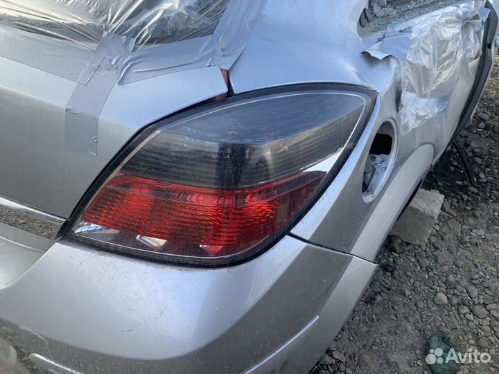 Opel astra h задний правый фонарь стоп
