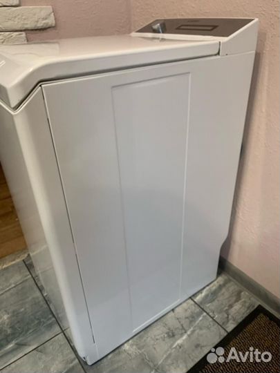 Стиральная машина с вертикальной загрузкой AEG