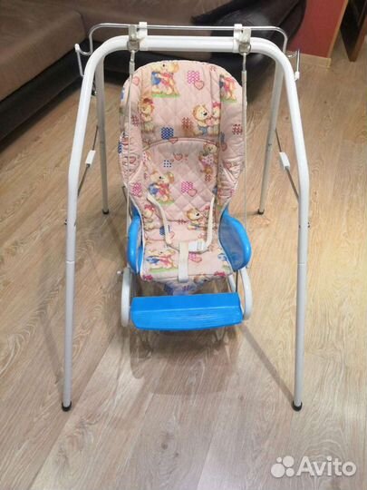 Детская качеля со столиком для кормления