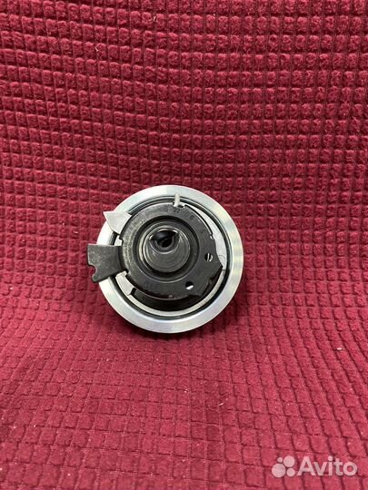 Натяжитель ремня грм skoda Octavia