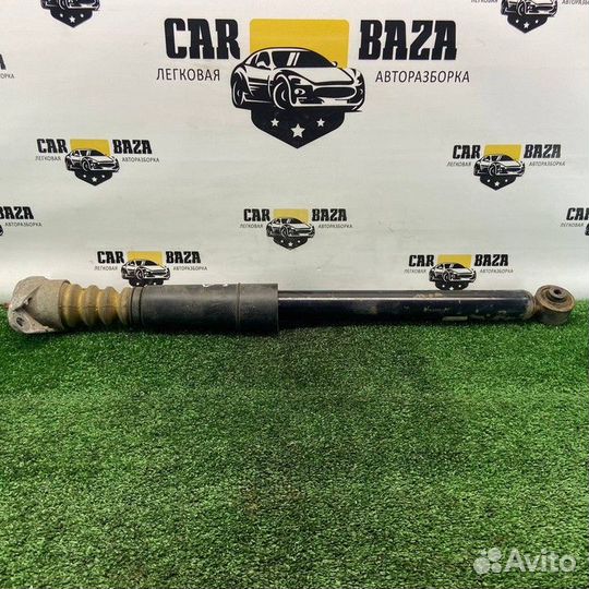 Амортизатор задний левый