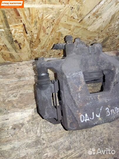 Суппорт тормозной передний правый Opel Astra J