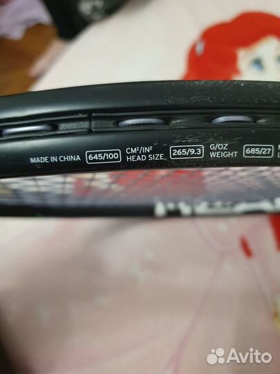 Теннисная ракетка