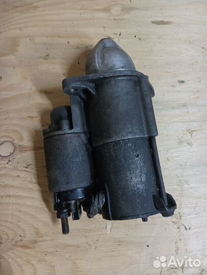 Стартер 55556092 Opel Astra ш