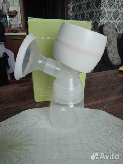 Электрический молокоотсос