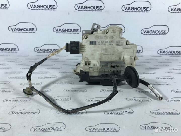 Замок двери задний левый Volkswagen Passat B7 1.4