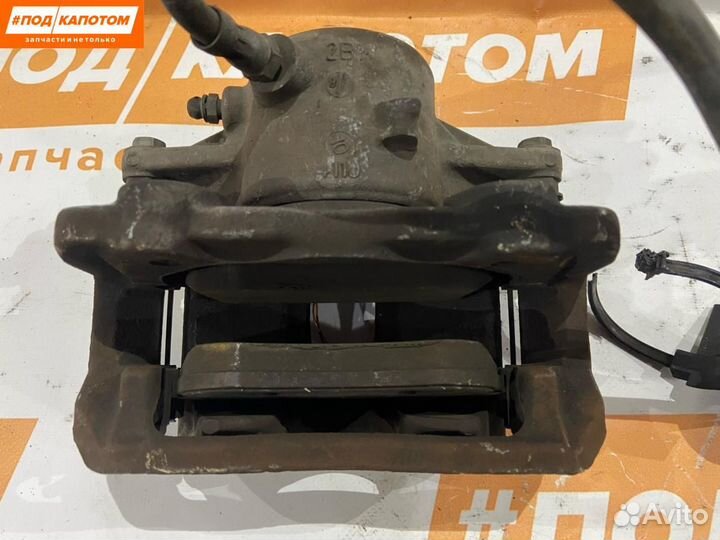 Суппорт тормозной передний левый Mercedes-Benz