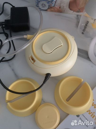 Молокоотсос medela swing maxi flex