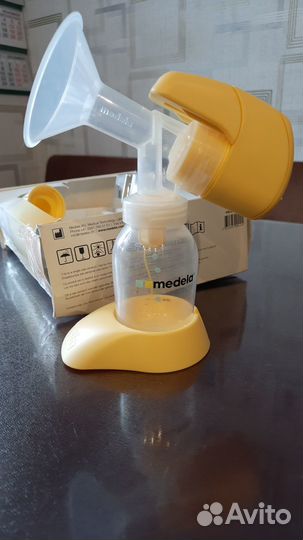 Молокоотсос medela