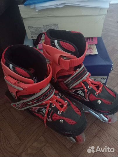 Роликовые коньки