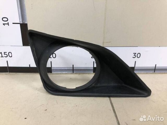 Рамка противотуманной фары правой Toyota Corolla E