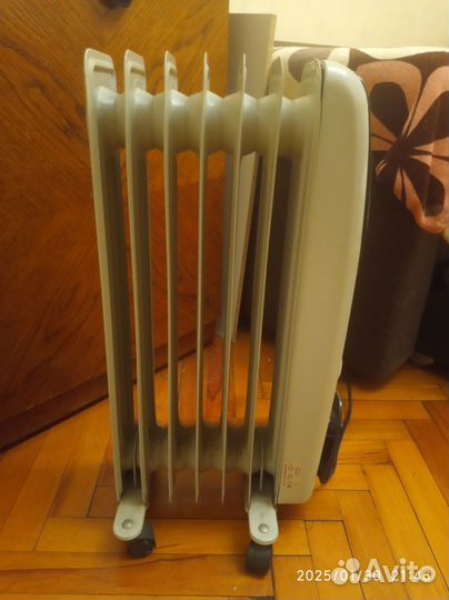 Масляный обогреватель